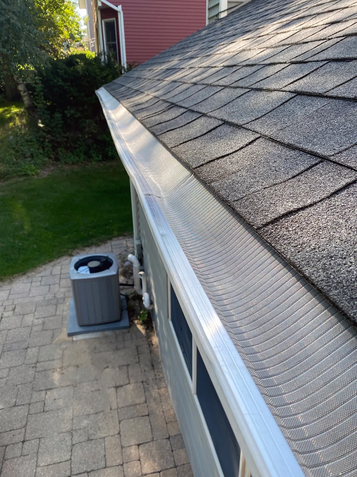 Gutter guard on roof edge